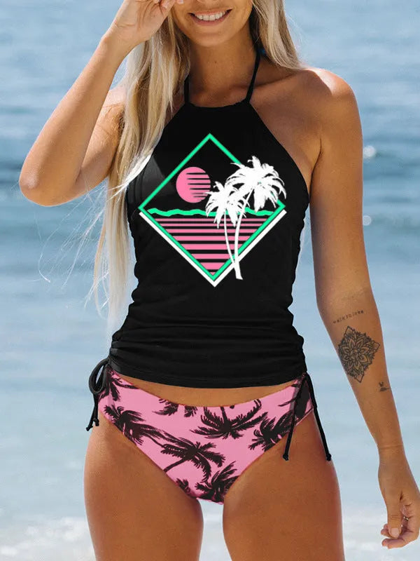 Conservative style women's swimsuit with colourful cartoon print and matching shorts.