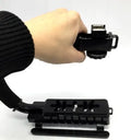 Handheld camera stabiliser bracket with plastic handle and sponge grip for SLR cameras