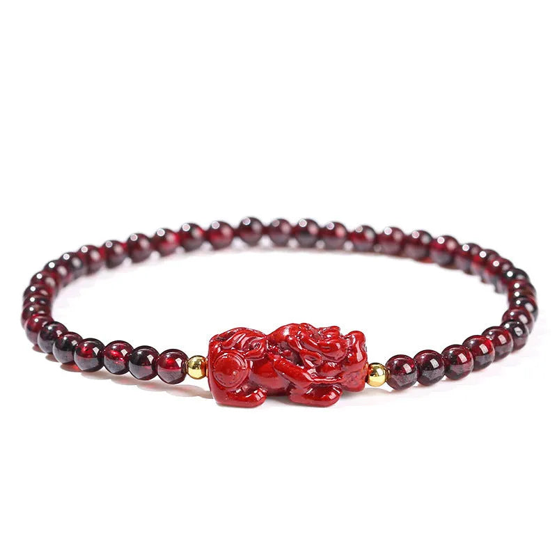 Natural garnet square bracelet with a carved purple sand and strawberry quartz Pixiu charm.