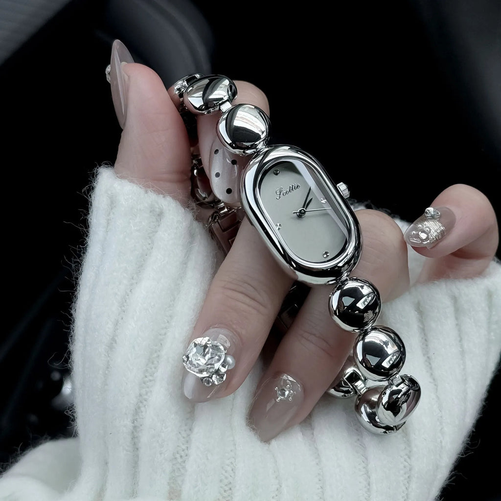 Women's oval fashion watch with bracelet strap in one of seven colour options.