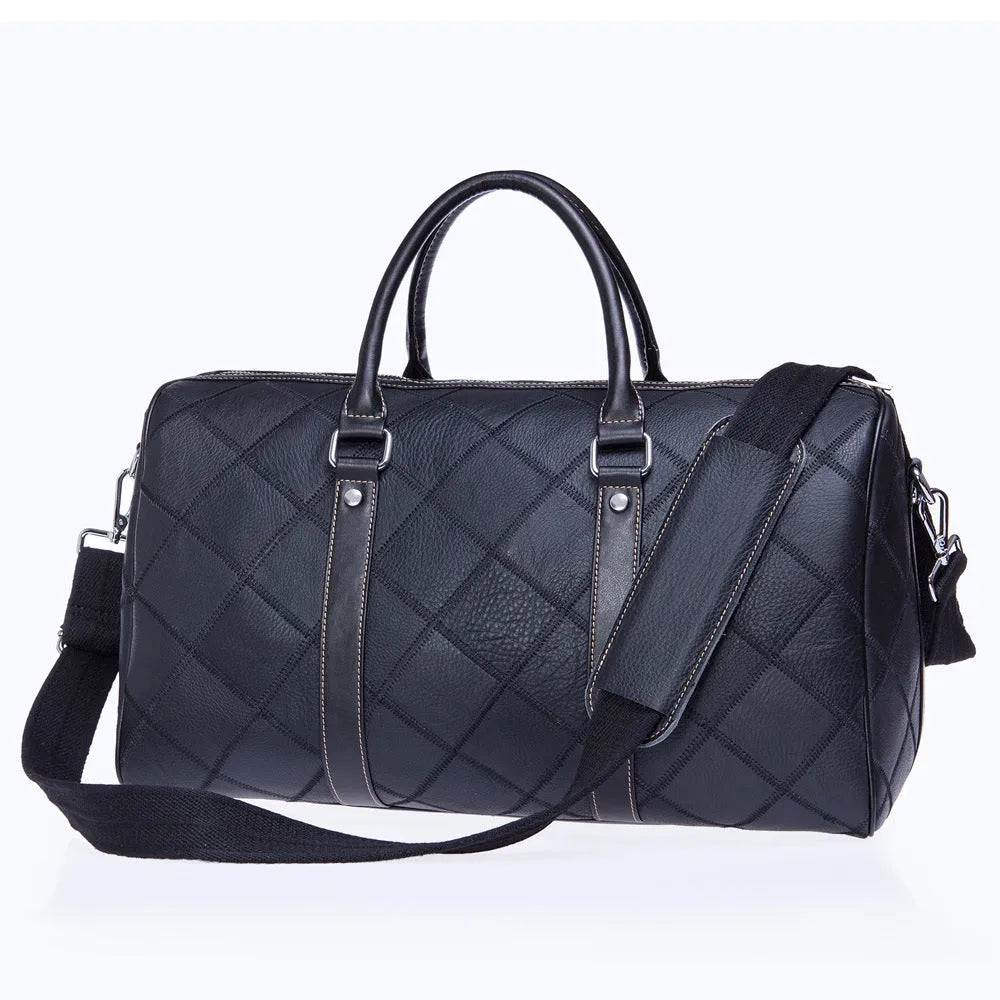 A vintage-style men's leather duffel bag in black with a single strap and internal organiser compartments.