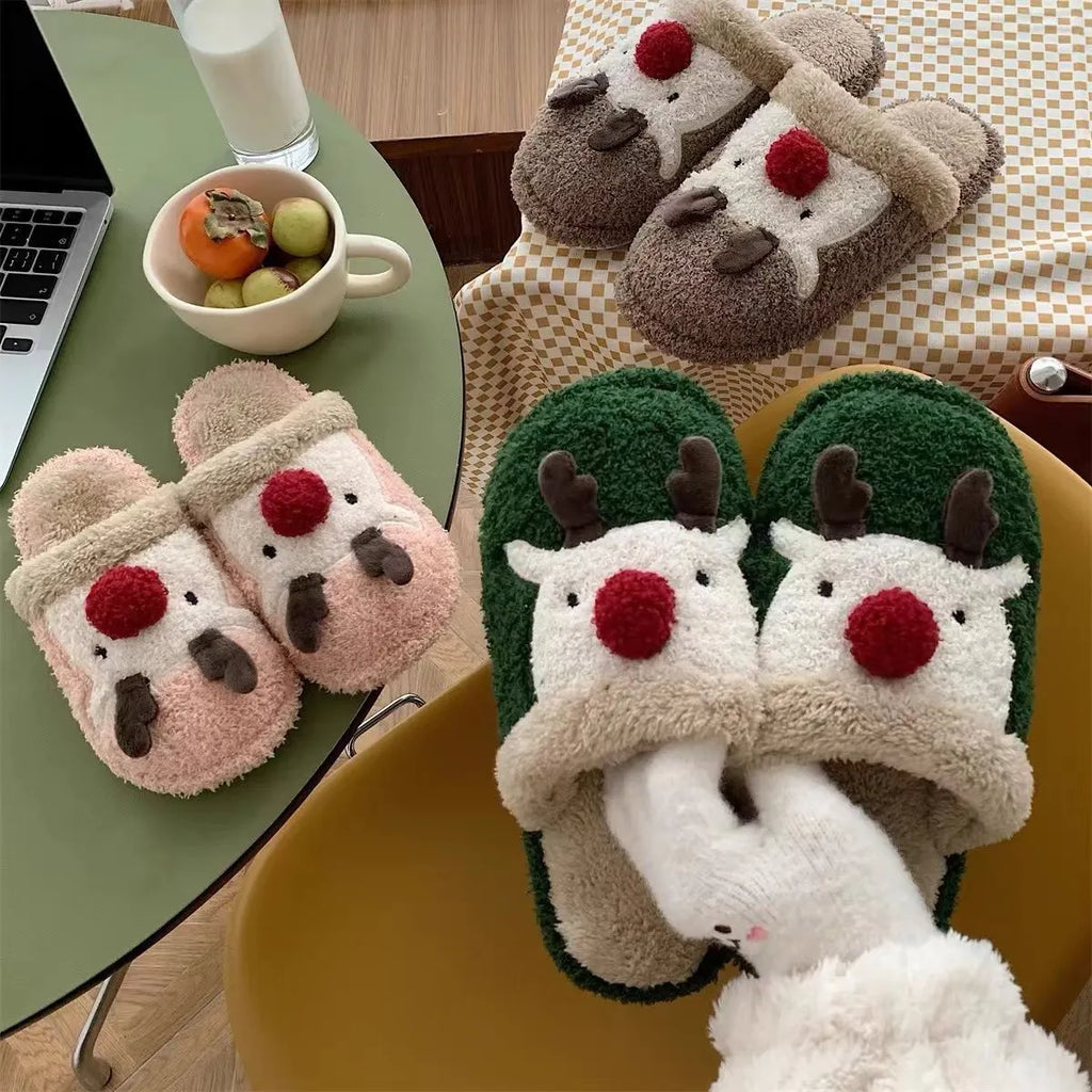 Women's green Christmas deer cotton plush slippers with non-slip PVC soles.