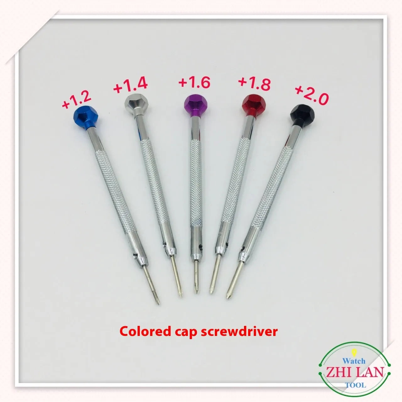 Set of six colour-coded watch repair screwdrivers with aluminium handles and a separate metre tool.