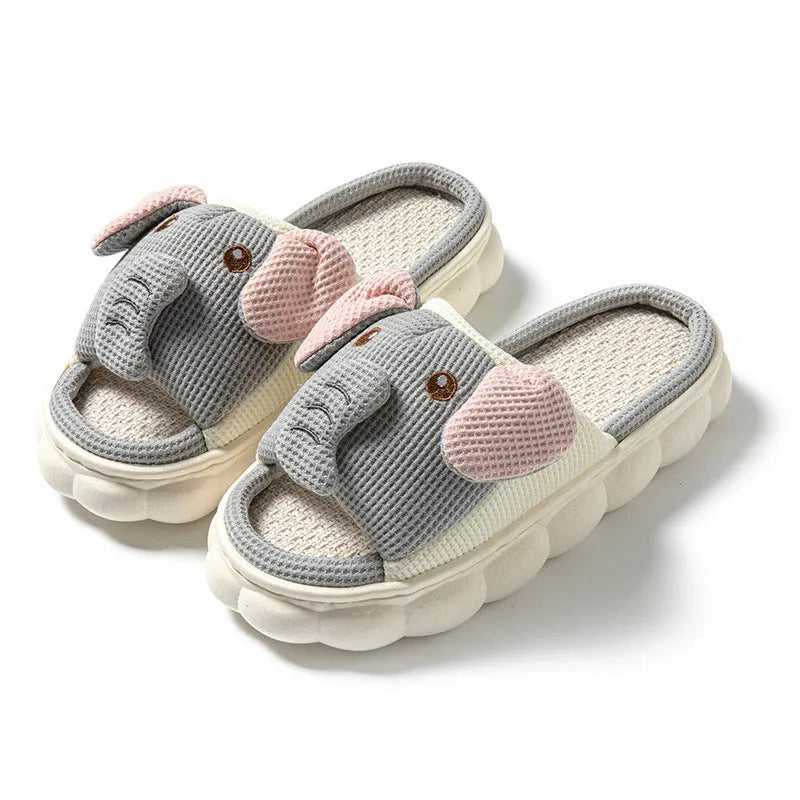 Elephant grey animal print open-toe linen slippers for couples on a PVC sole.