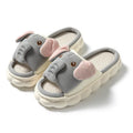 Elephant grey animal print open-toe linen slippers for couples on a PVC sole.