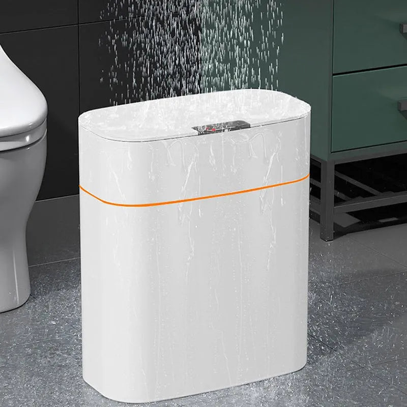 White automatic smart trash can with sensor lid on a kitchen floor.