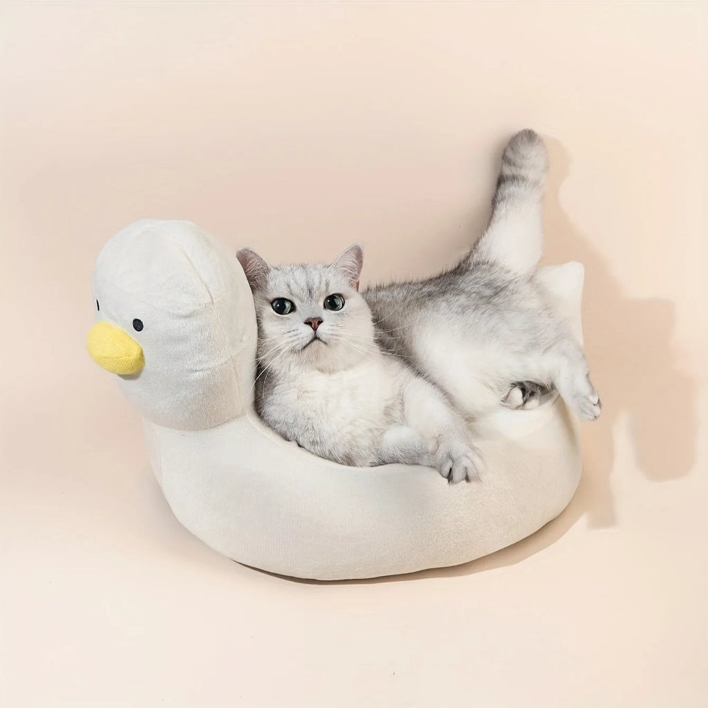 Blue duck-shaped fluffy pet bed for small dogs and cats on floor