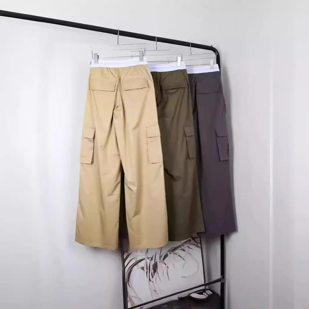 Loose straight cotton trousers with elastic waistband in khaki, army green, or gray, sizes S to L