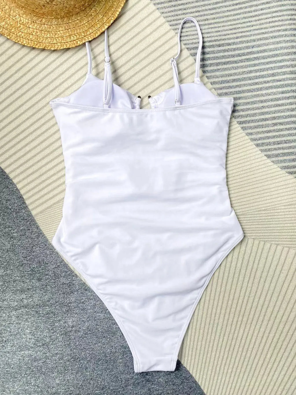 Solid black one-piece swimsuit for women on a mannequin.