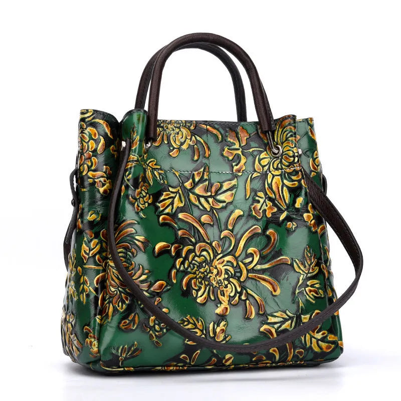 Trendy women's three-dimensional embossed first layer cowhide messenger bag with floral pattern in brown