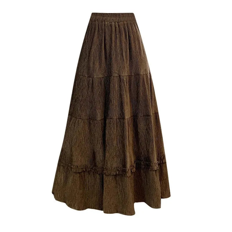 Corduroy midi A-line skirt with elastic waistband in milk white, shown on a model.