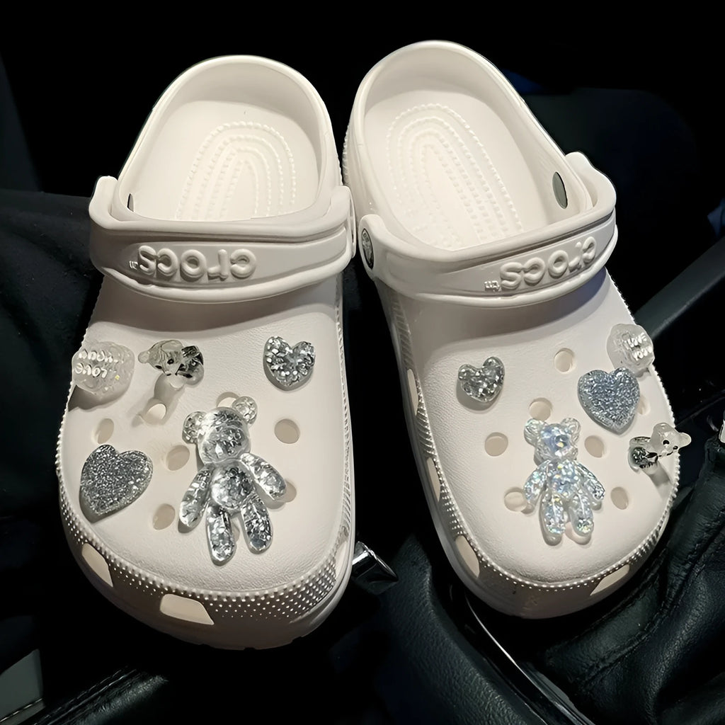 Crystal cloud bear shoe buckle set with resin, plush, and plastic details on a white background
