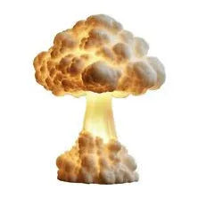Modern atomic mushroom cloud shaped USB table lamp on a dark surface.
