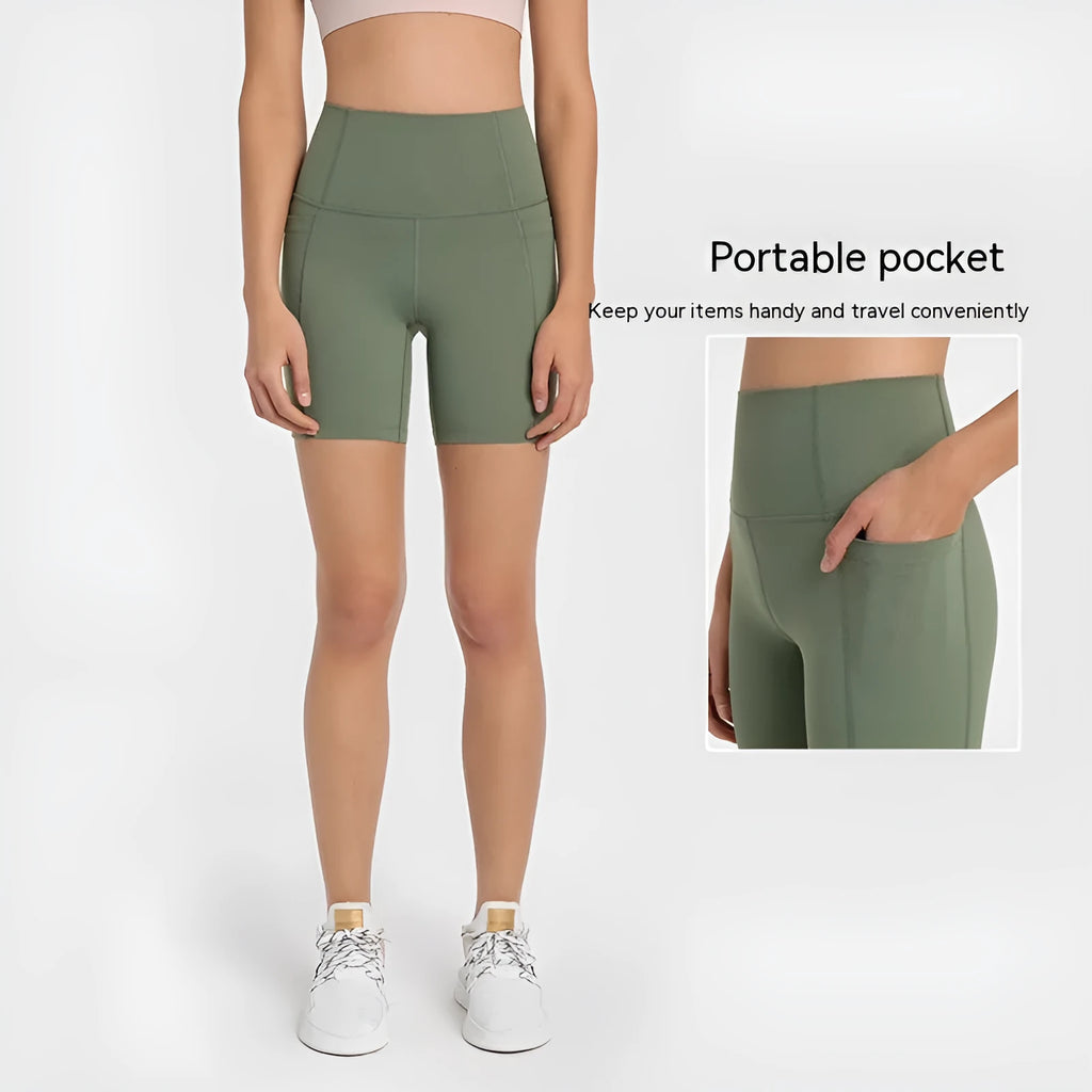 Women's tight-fitting super stretch sports shorts in grey lake green, short length for running.