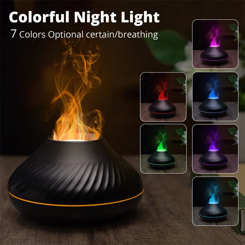 Beige volcanic flame aroma diffuser with LED light on a wooden table next to an essential oil bottle