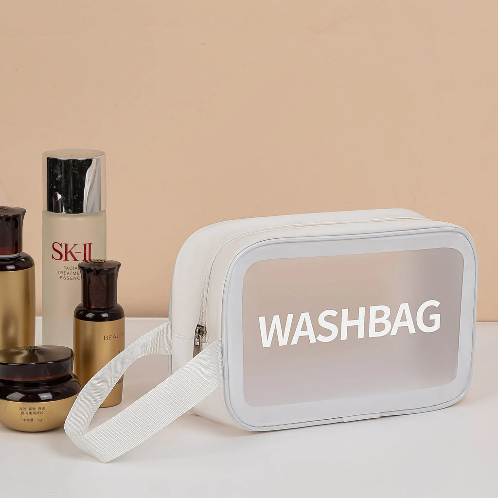 Set of three transparent PVC wash bags in large, medium and small sizes for cosmetics and hygiene storage