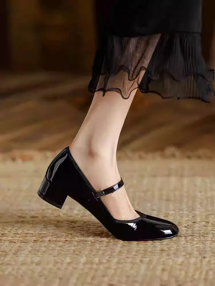 Women's chunky heel pumps in black cowhide leather with buckle fastening and square heel