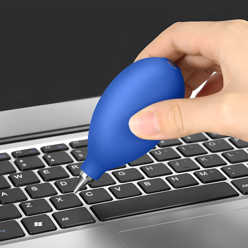 Blue rubber dust removal air blower cleaning tool for cameras and mobile phones.