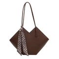 Beige women's large shoulder bag made of PU leather with multiple pockets and an adjustable strap.