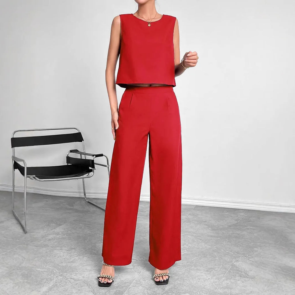 Women's red sleeveless top and wide leg pants two-piece casual set on a hanger.