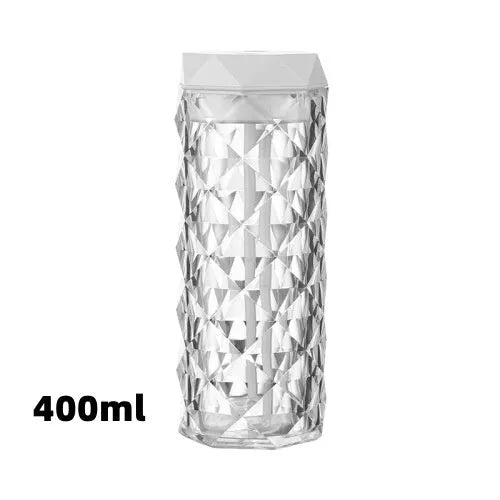 Crystal lamp humidifier with 1000ml tank showing cool mist and RGB night light on desktop