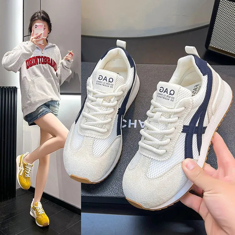 Women's white low-top lace-up sneakers with round toe and plastic sole