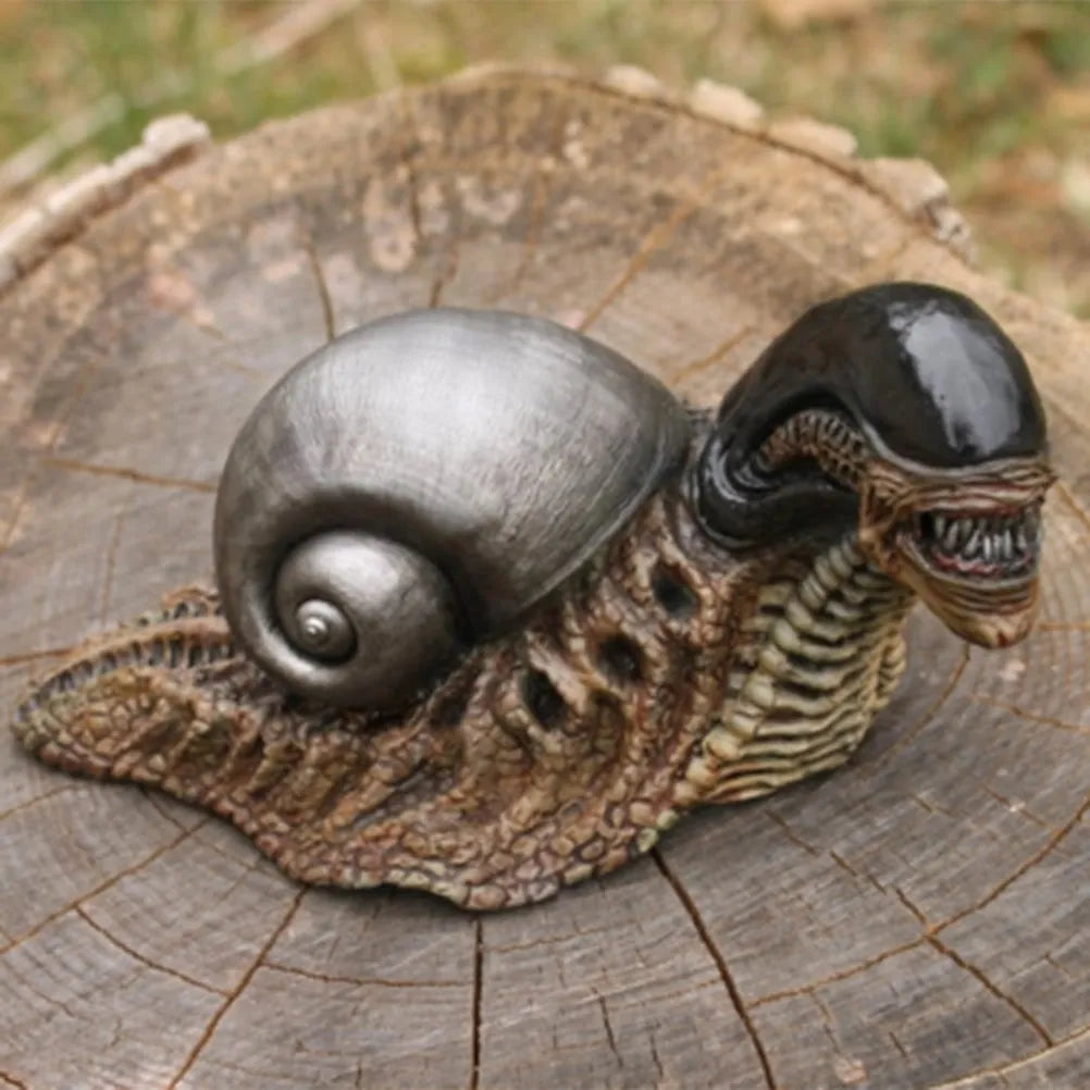 Resin garden snail sculpture with character design and coloured finish