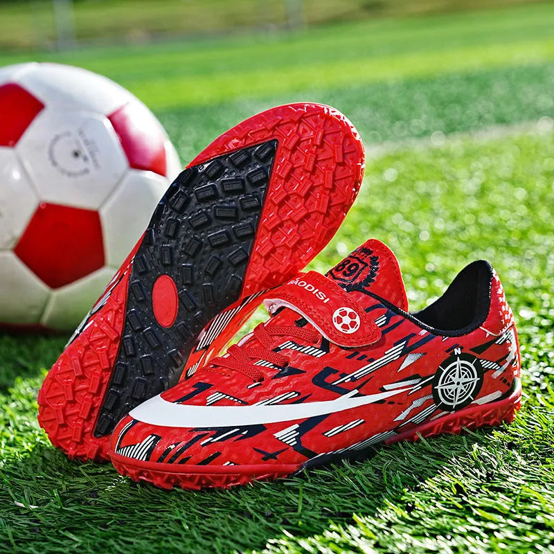 Children's football shoes with Velcro fastening, non-slip rubber outsole, and spikes in sky blue colour, low-top design