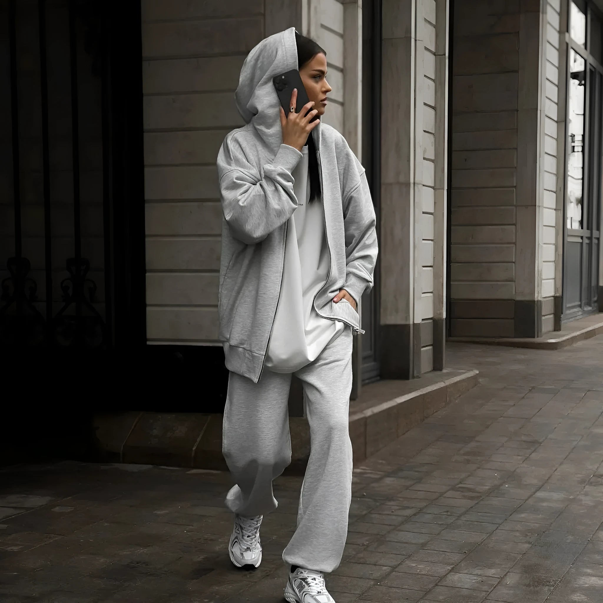 Red loose fit polyester two-piece set featuring a long-sleeved coat and matching trousers for a street style look.