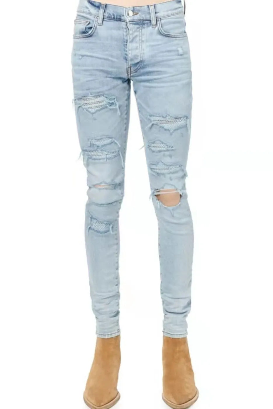 Light blue slim fit men's jeans with patch details, holes, and enzyme-washed finish