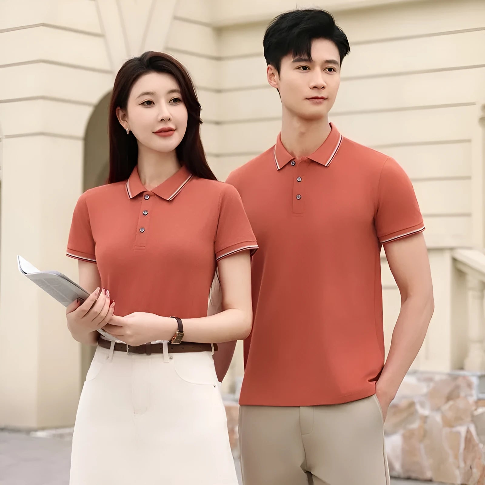 Solid colour ice silk polo shirt on a hanger showing apricot colour variant