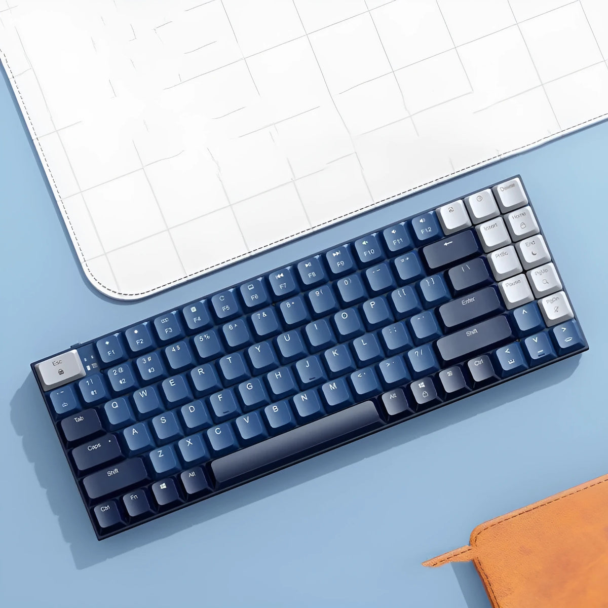 Ku102 mechanical keyboard in Deep Sea Blue with monochrome backlit keys and tea axis switches