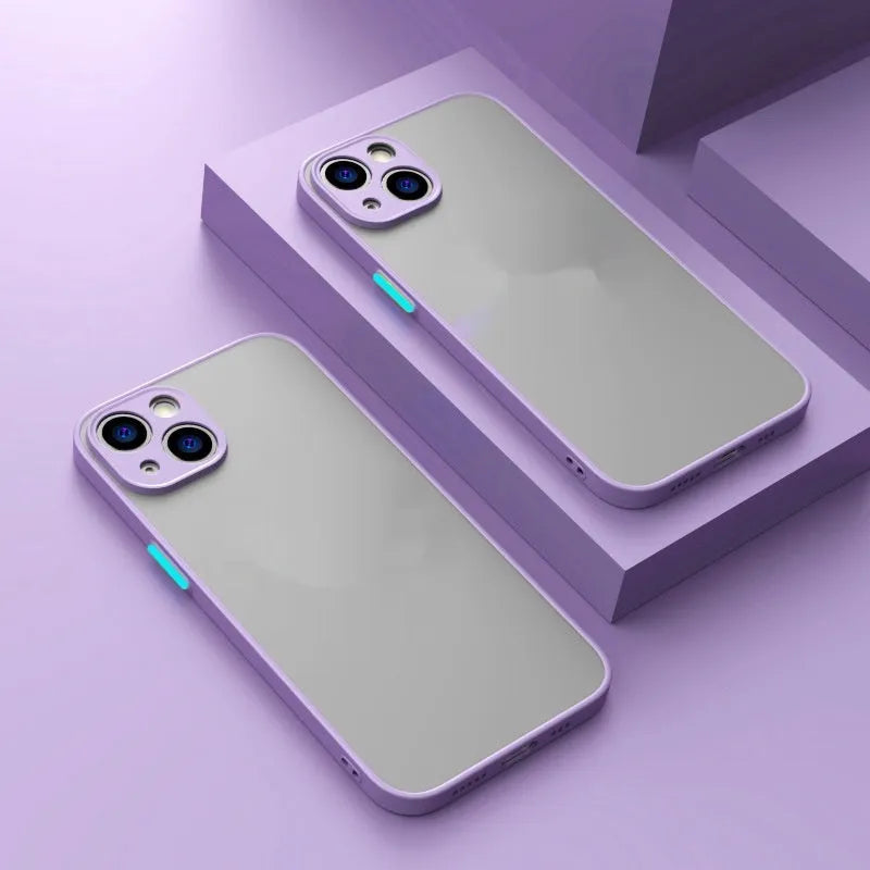Frosted skin magnetic suction iPhone case in multiple colours on a table