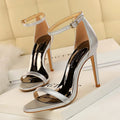 Women's open-toe high heel sandals with an ankle buckle strap in a selection of colours.