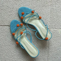 Cyan-coloured women's lace-up heeled sandals with thin straps and open toe design