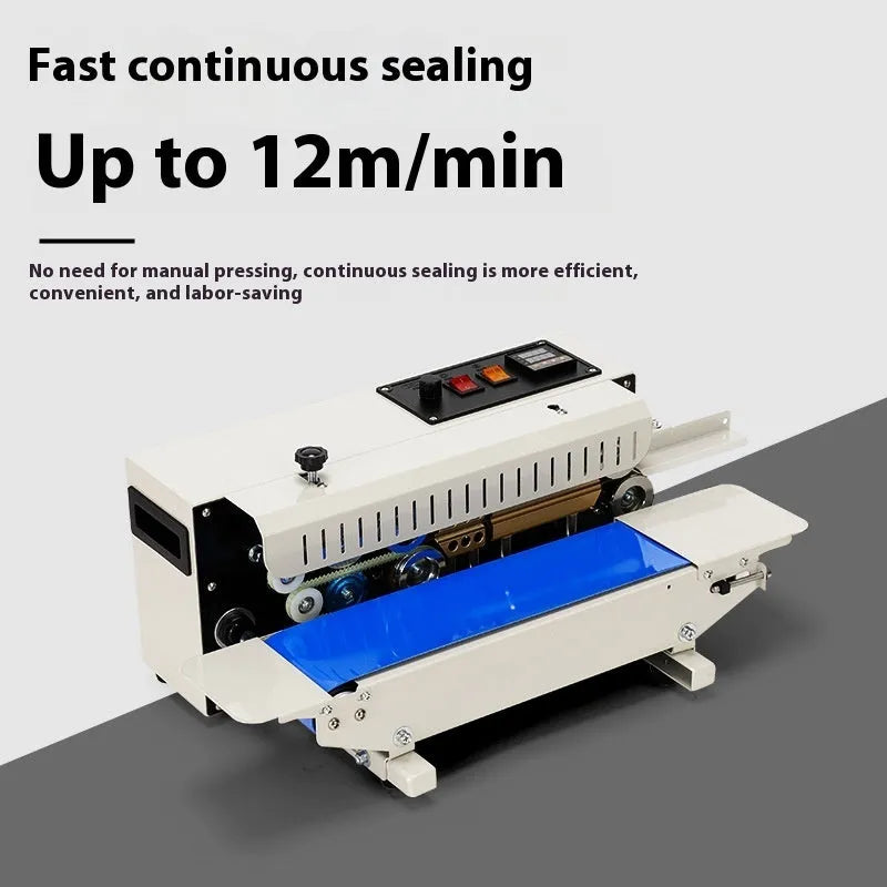 Mini benchtop heat sealing machine with steel jaw and integrated date print function on a work surface.