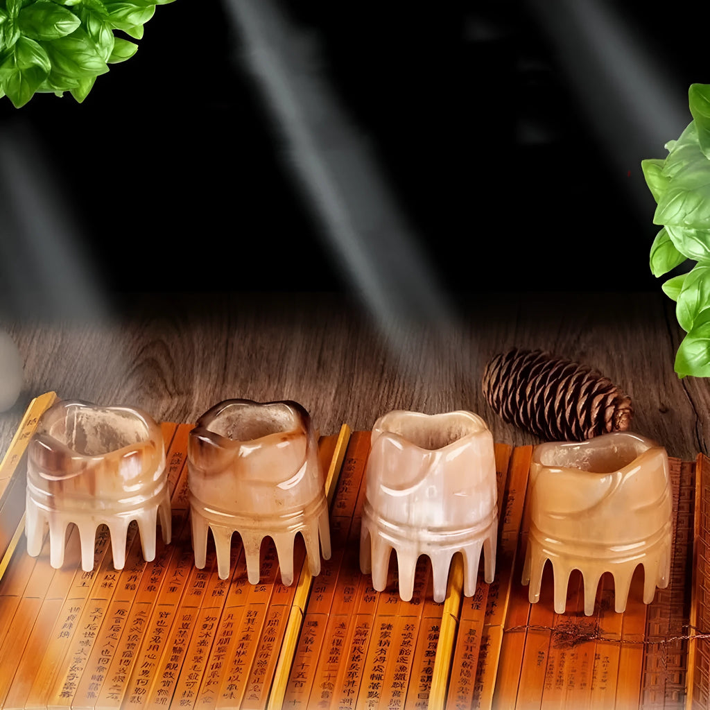 Black buffalo horn comb with wide teeth and a pointed long tip for hair and scalp massage.