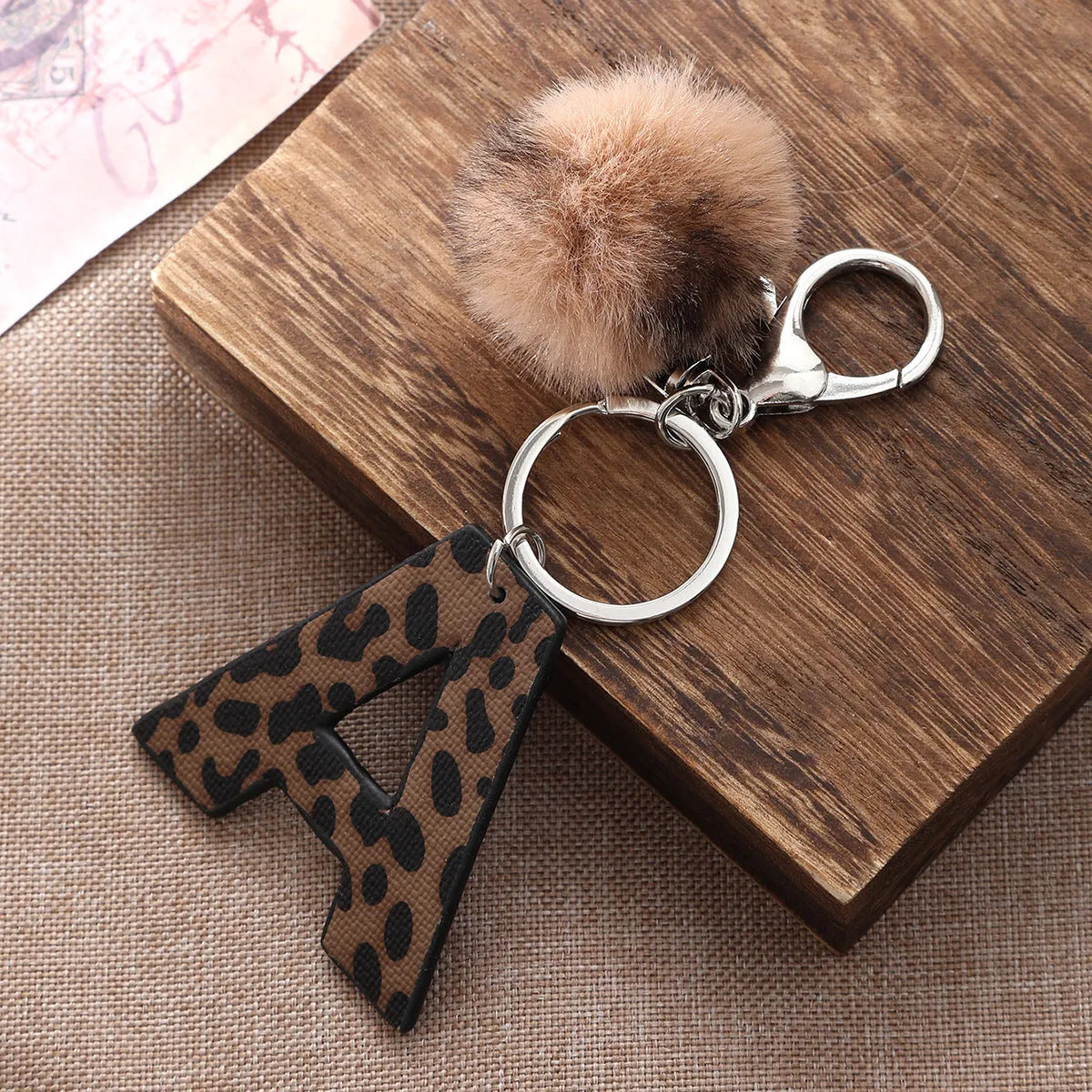 Retro leopard-print oil-edged letter acrylic keychain on artificial leather strap with metal keyring