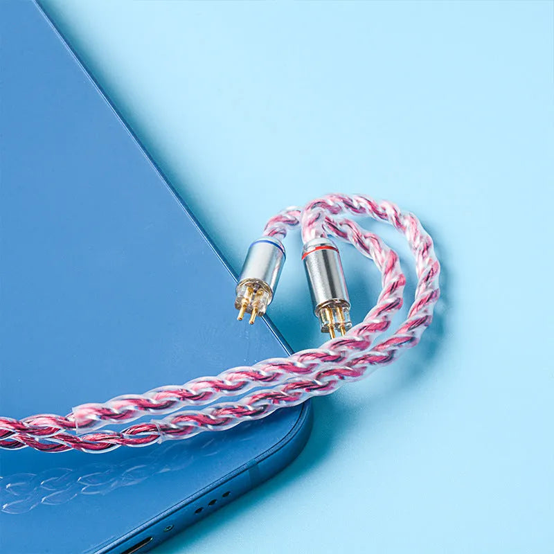 Black German pure copper headphone cable with 3.5mm angled plug and MMCX connectors on a light background