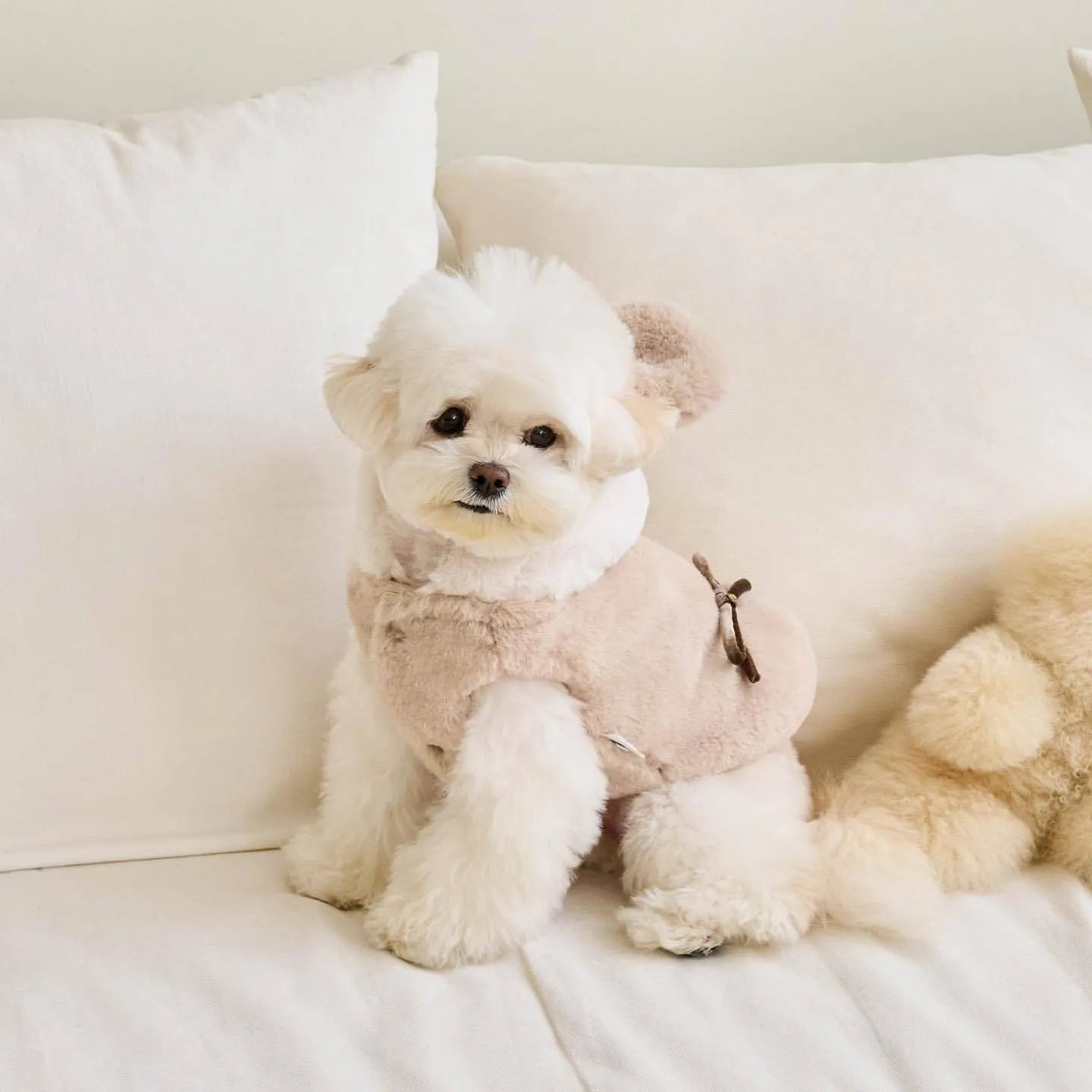 Light pink polyester dog warm coat shown in size M with casual styling