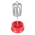 Portable wheel hub balancer with aluminium head and bull's eye level on an enamel base.