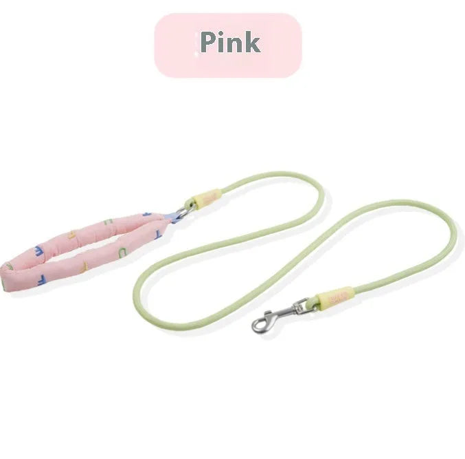 Polyester dog leash with hand holding rope in pink, green, purple, or raspberry powder colours