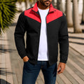 Men's green windproof jacket with high collar and matching zip, showing raglan sleeve construction.
