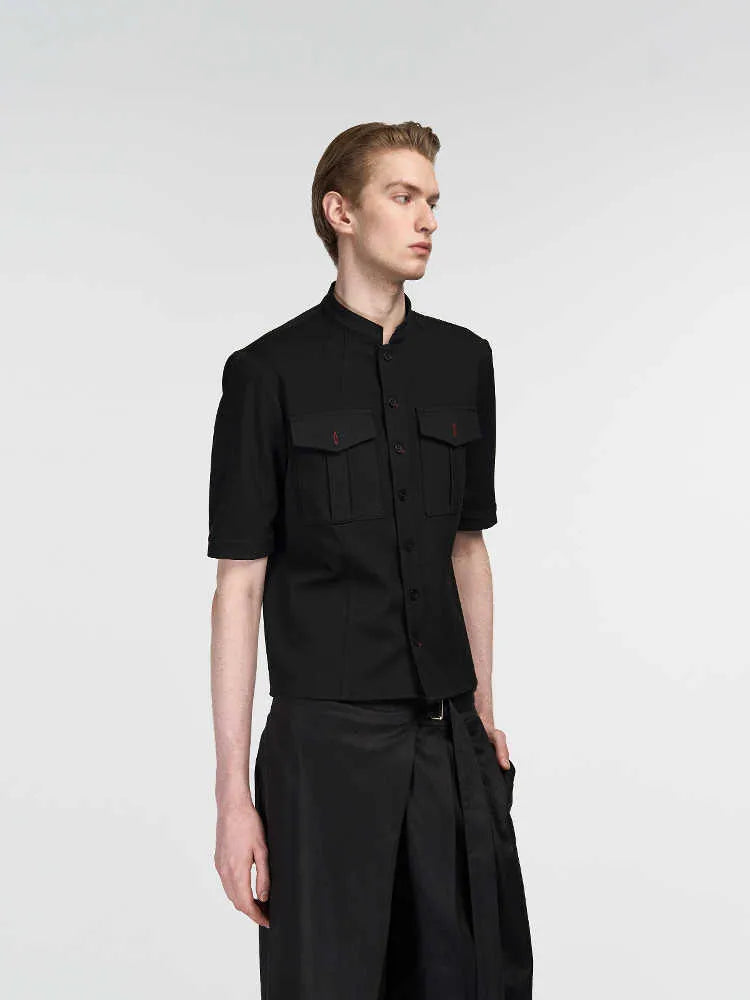 Handmade black half sleeve men's shirt with a shirt collar and loose fit for casual hunting wear.