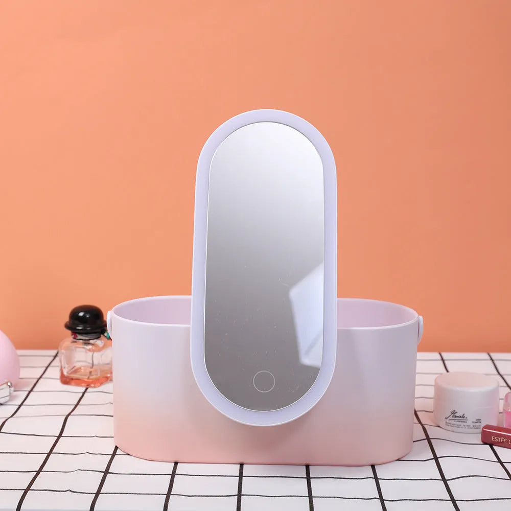 Portable pink LED makeup mirror storage box with cosmetic compartments open