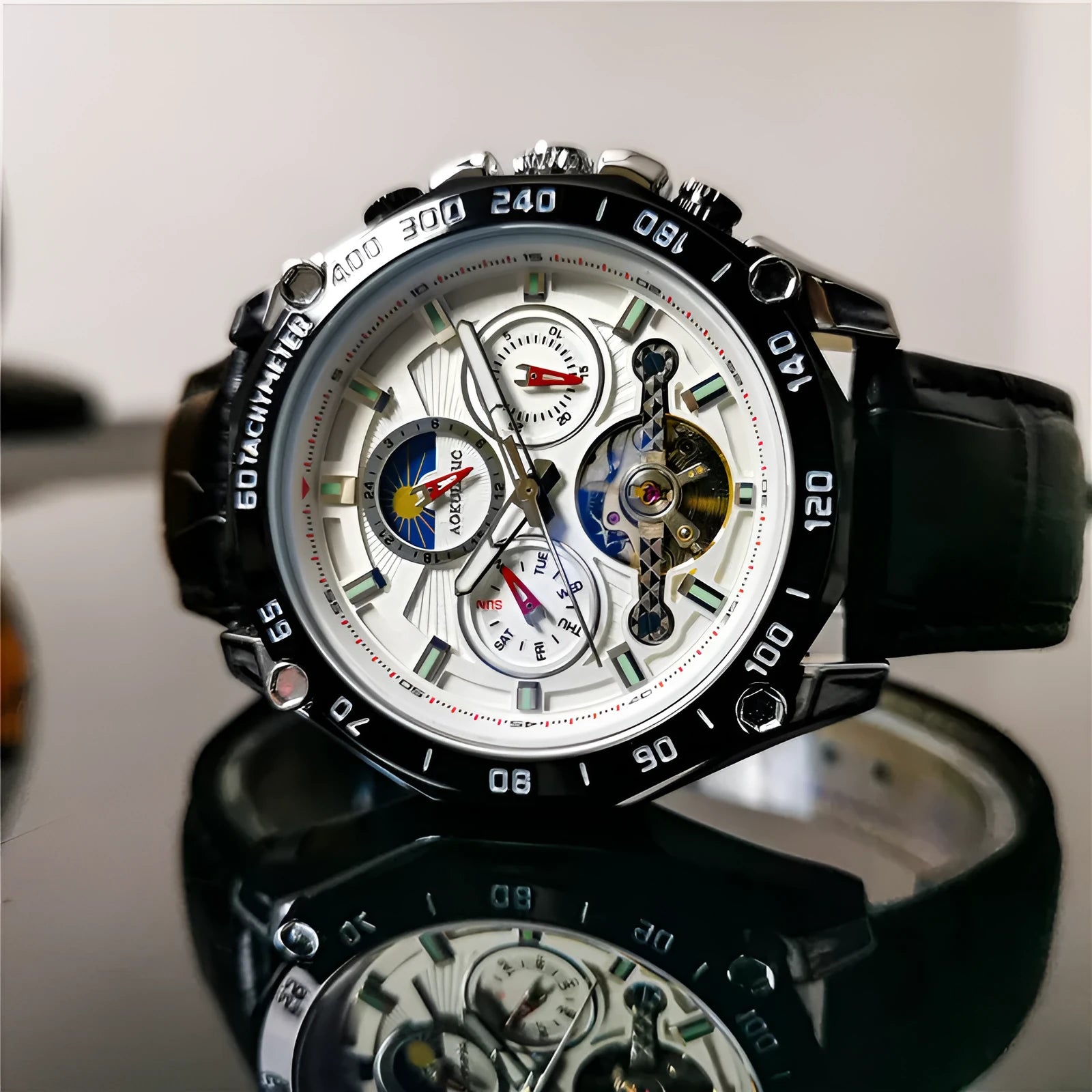 Men's automatic mechanical watch with a 12mm case in silver, black, and gold colour options on a wrist.