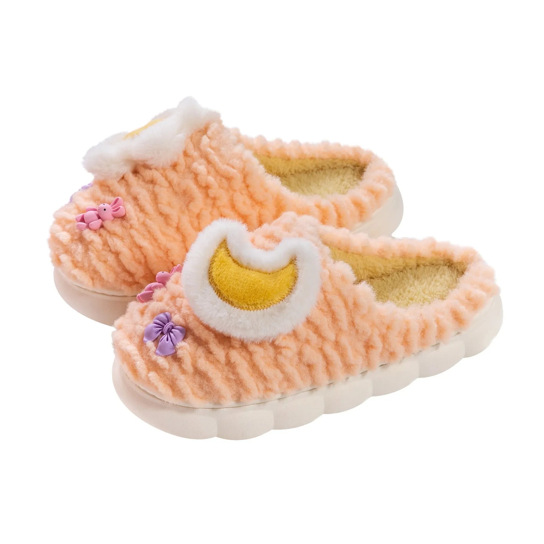 Light blue women's plush slippers with an animal pattern on the round toe holder and a thick fleece lining.