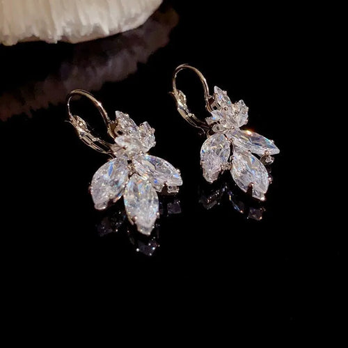 Alloy women's earrings with inlaid zircon leaves design platinum colour
