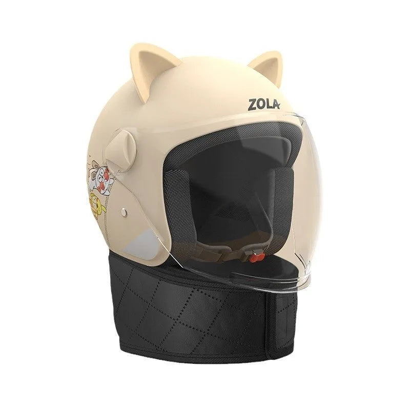 Winter electric bike helmet with attached blue scarf and clear anti-fog visor shown on a bicycle handlebar.