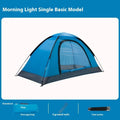 Single person portable camping tent in green, shown unfolded with fibreglass pole.